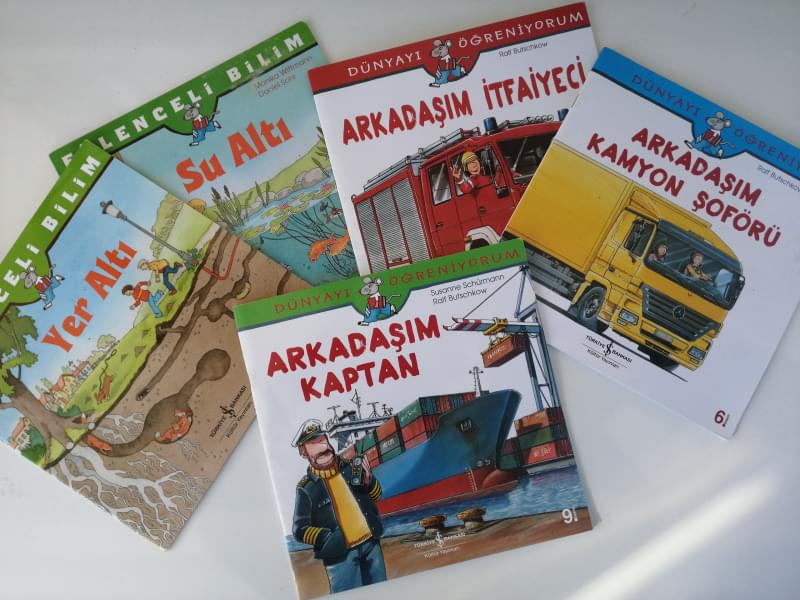 Four children's books with colourful covers and titles in Turkish